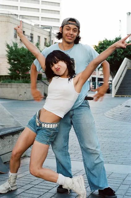 Boyfriend and girlfriend, playful street portrait