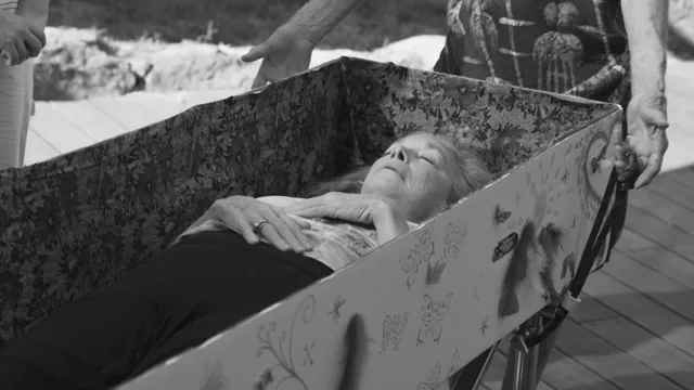 Body in cardboard casket