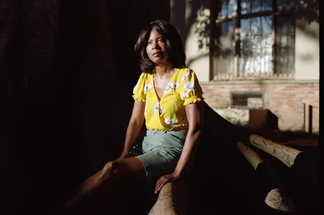 Woman in yellow shirt